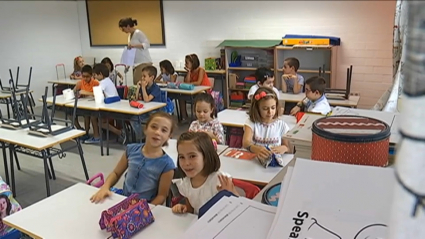 Niños y niñas en clase