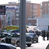 Coches de la Guardia Civil en la calle de las naves intervenidas