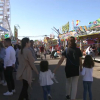 Familias en la Feria de Cáceres esta tarde