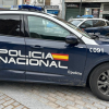Vehículo de la Policía Nacional en Mérida tras la entrega de la menor a su madre
