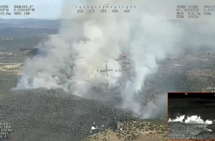 Imagen del incendio desde un helicóptero con bastante humo